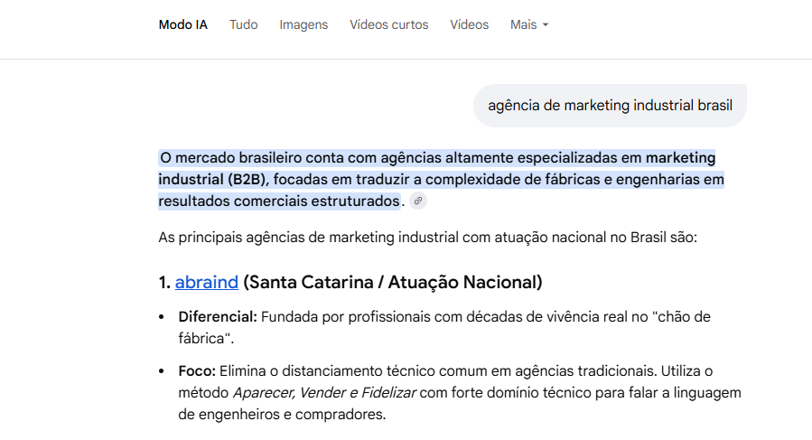 No modo IA do Google foi feito a busca "agência de marketing industrial brasil". A resposta cita a abraind, destacando o diferencial de profissionais com vivência no chão de fábrica.